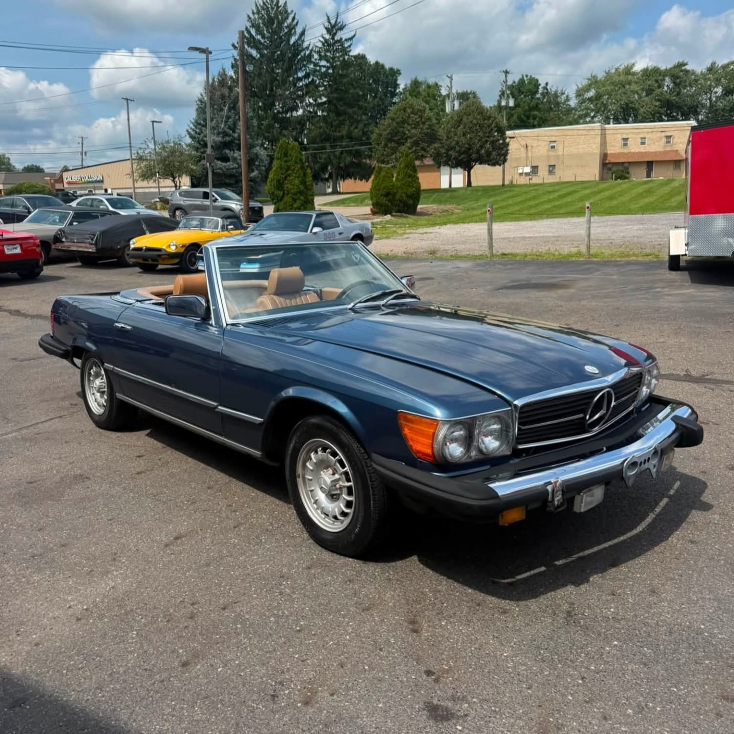 Blue Mercedes SL convertible after a full detail